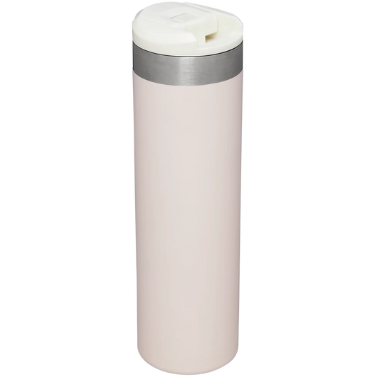 A beige Stanley AeroLight Transit bottle with a stainless steel cap and a logo on the front.