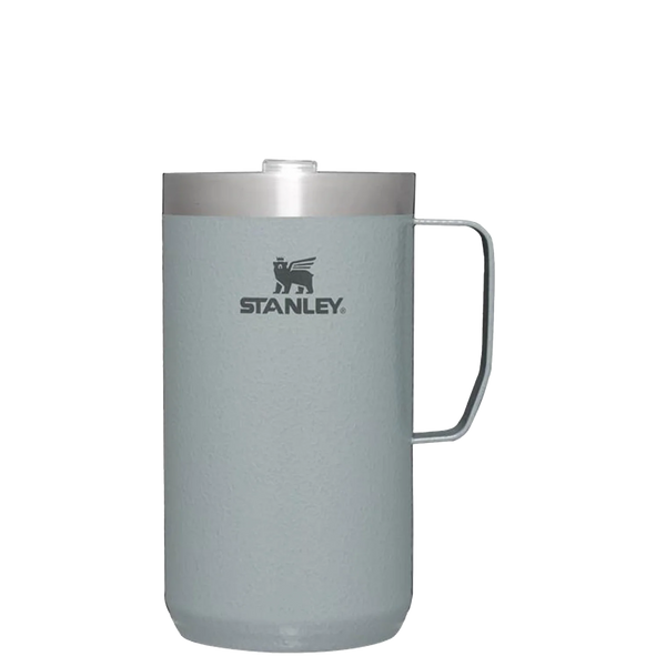 A Grey Stanley Stay Hot Camp Mug with a stainless steel body and a Tritan Drink-Thru Lid.